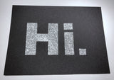Postkarte mit Glitzerschrift "Hi."